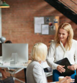 creative-discussion-business-people-office-with-tablet-laptop-collaboration-with-management-planning-consulting-women-desk-advice-opinion-design-team-digital-agency